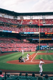people watching baseball game during daytime