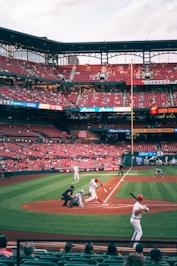people watching baseball game during daytime