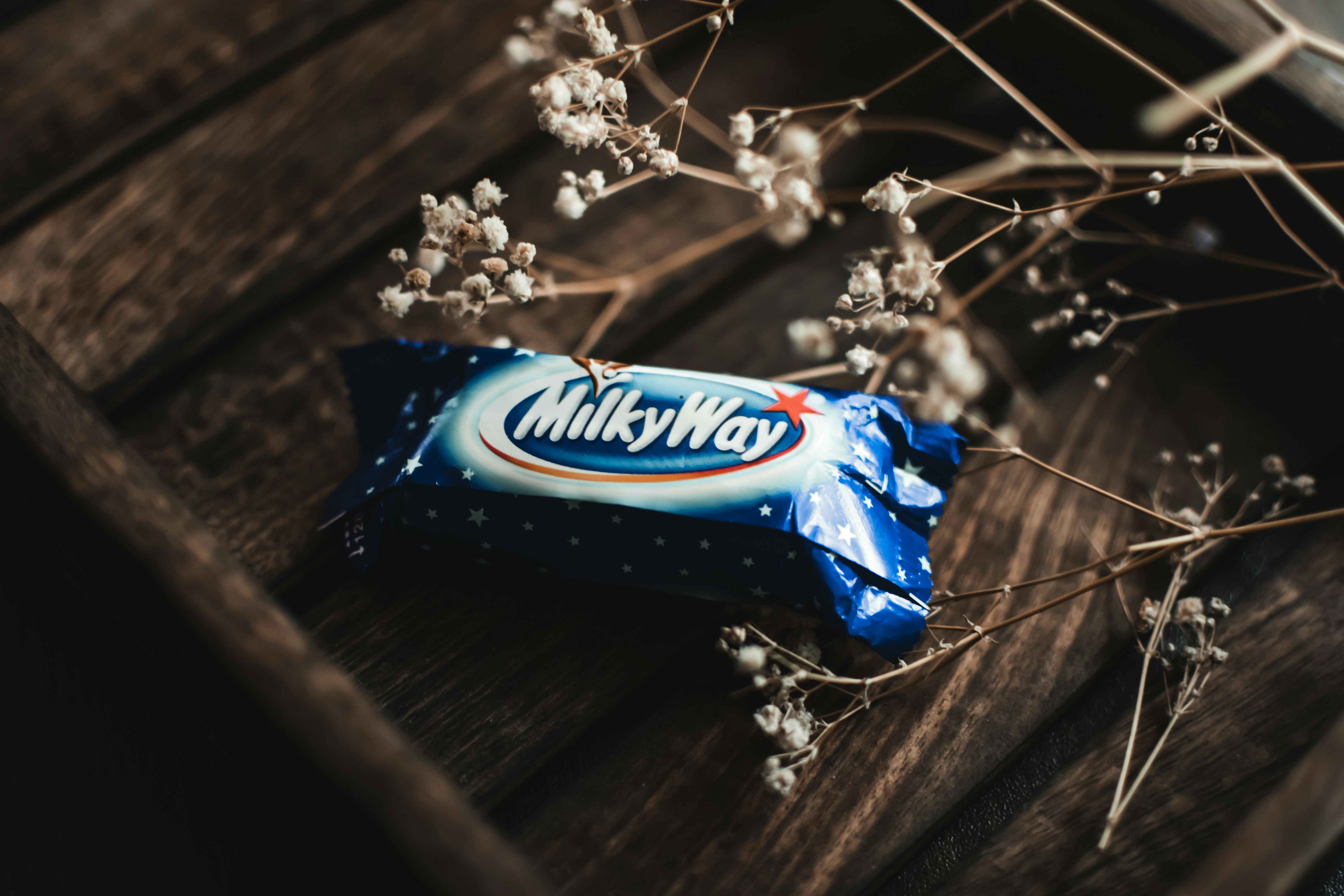 Milky Way chocolate bar with caramel and nougat in blue wrapper