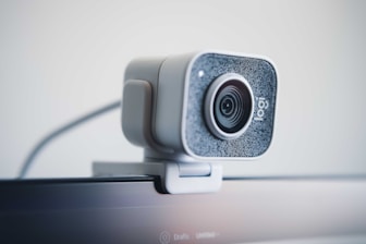 black and silver speaker on white table