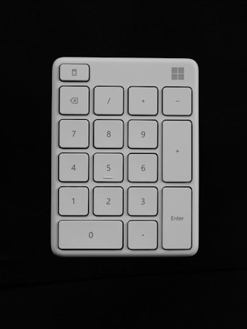 A sleek, modern calculator interface with clear numeric buttons and a minimalist design.