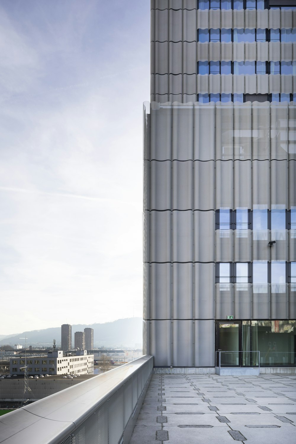 gray concrete building under white sky during daytime