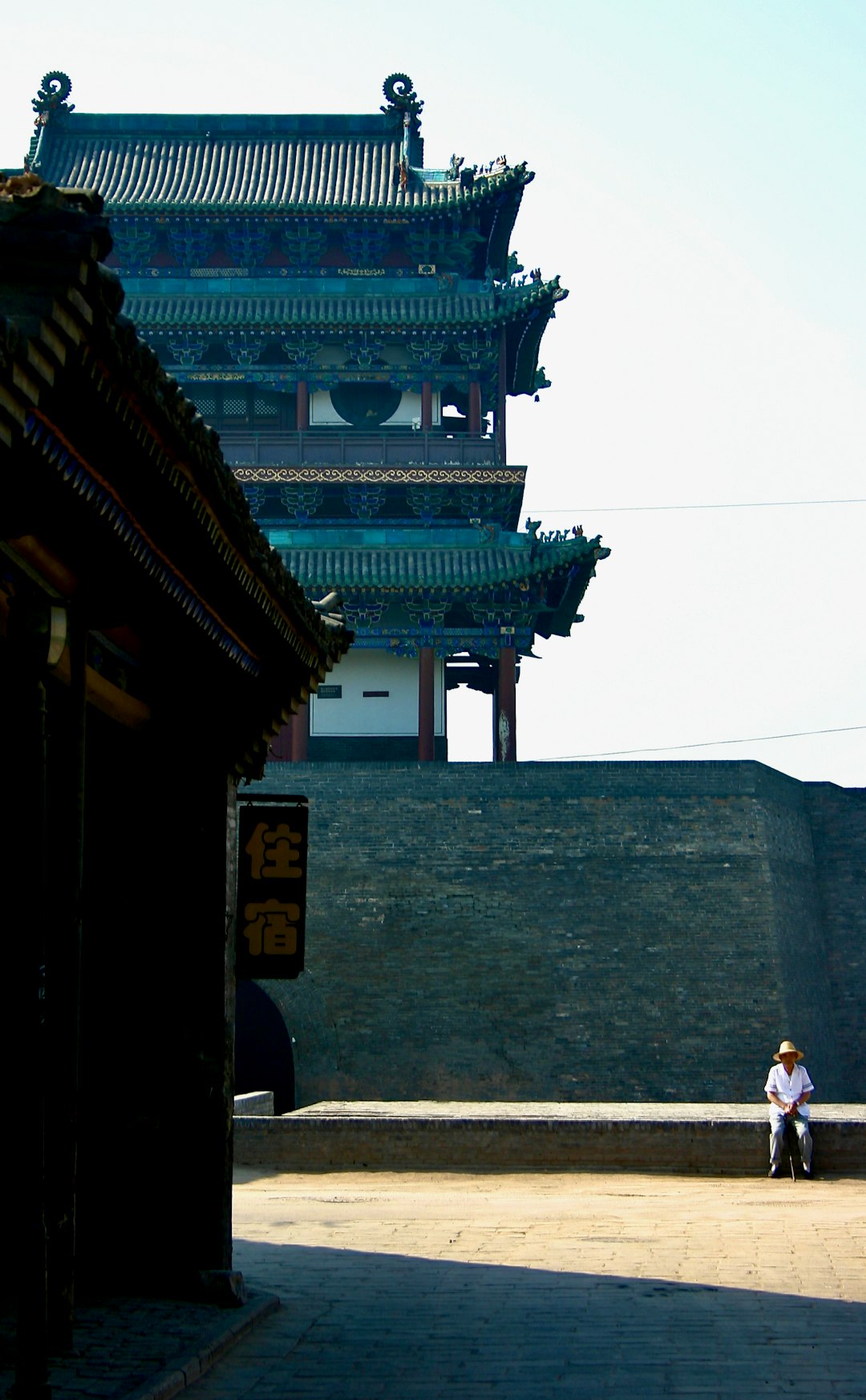 people walking on street near gray concrete building during daytime