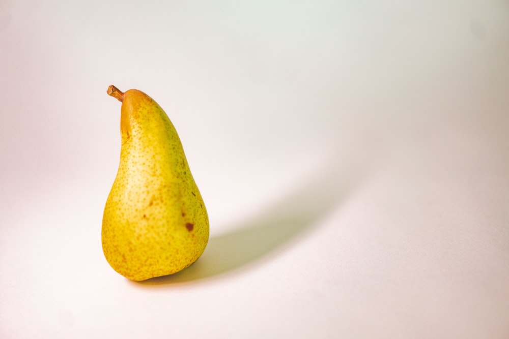 yellow fruit on white surface