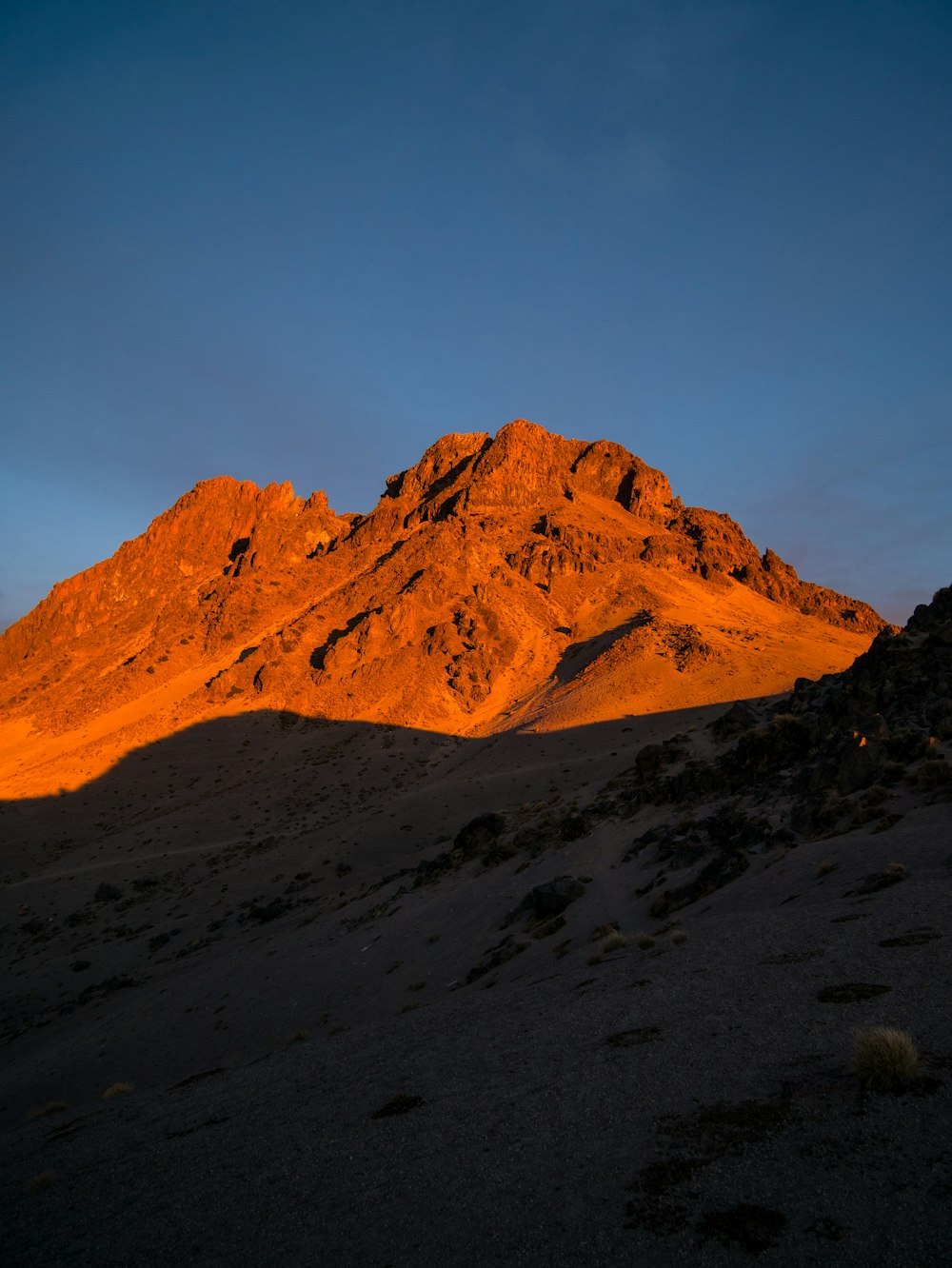 brown mountain under blue sky during daytime