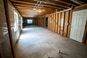 A basement transformation showing cozy, finished living space.