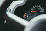 A close-up of a fuel gauge showing optimal levels.