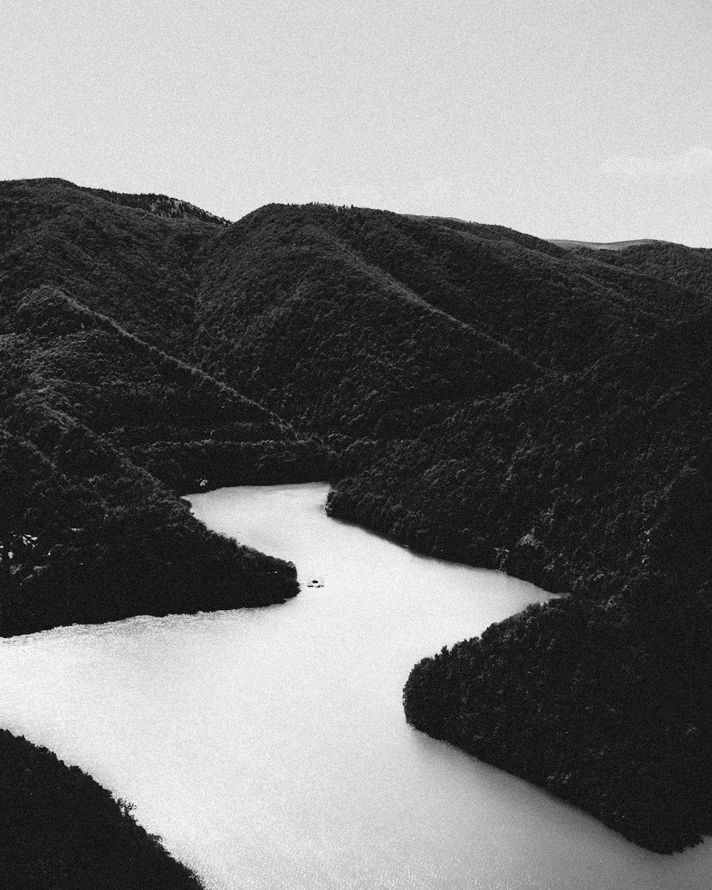 grayscale photo of mountain ranges