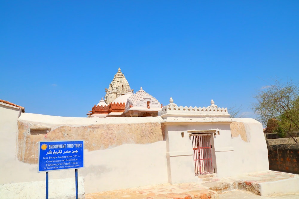 white concrete building under blue sky during daytime