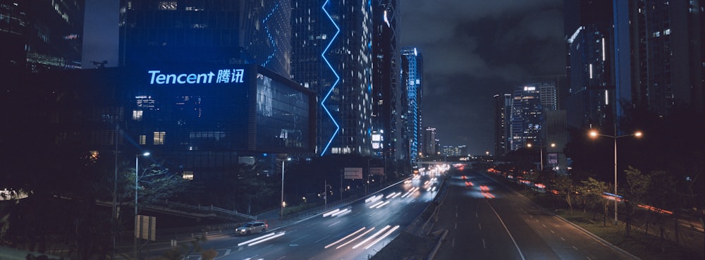 time lapse photography of city buildings during night time