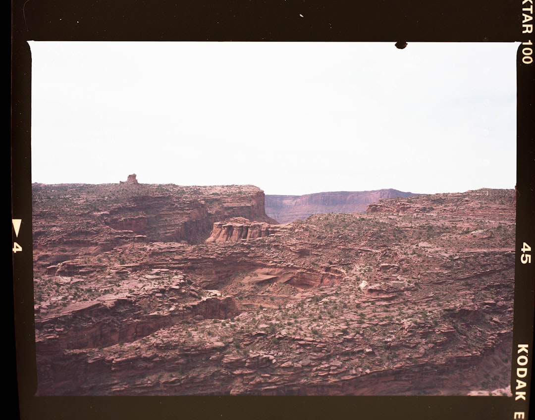 brown rocky mountain under white sky during daytime