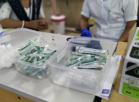 A team preparing medical supplies for transport.