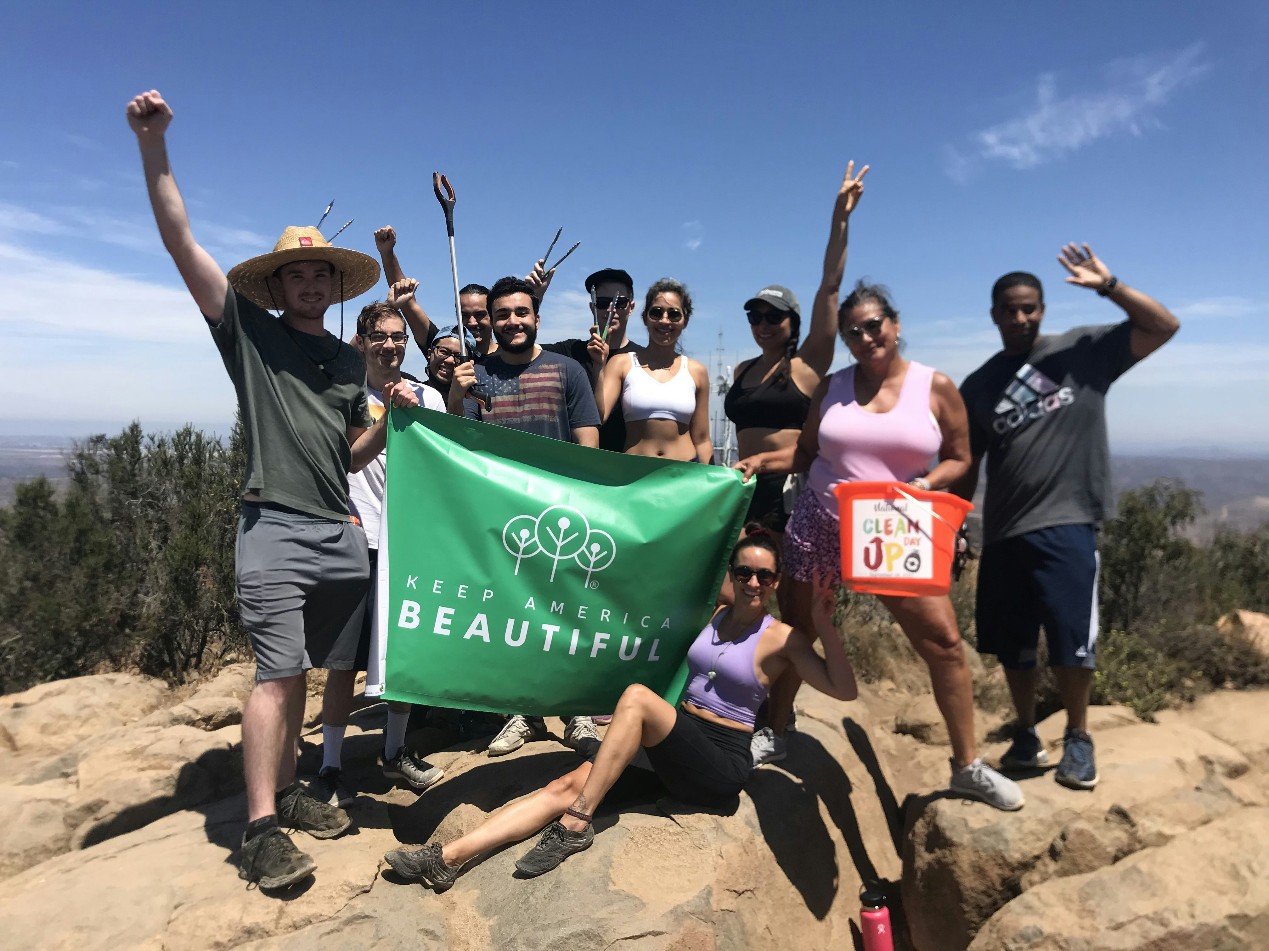 group of people holding flags during daytime