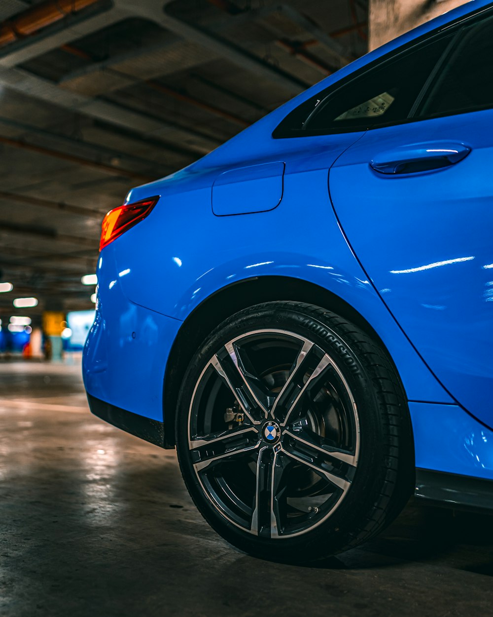 blue car in a parking lot