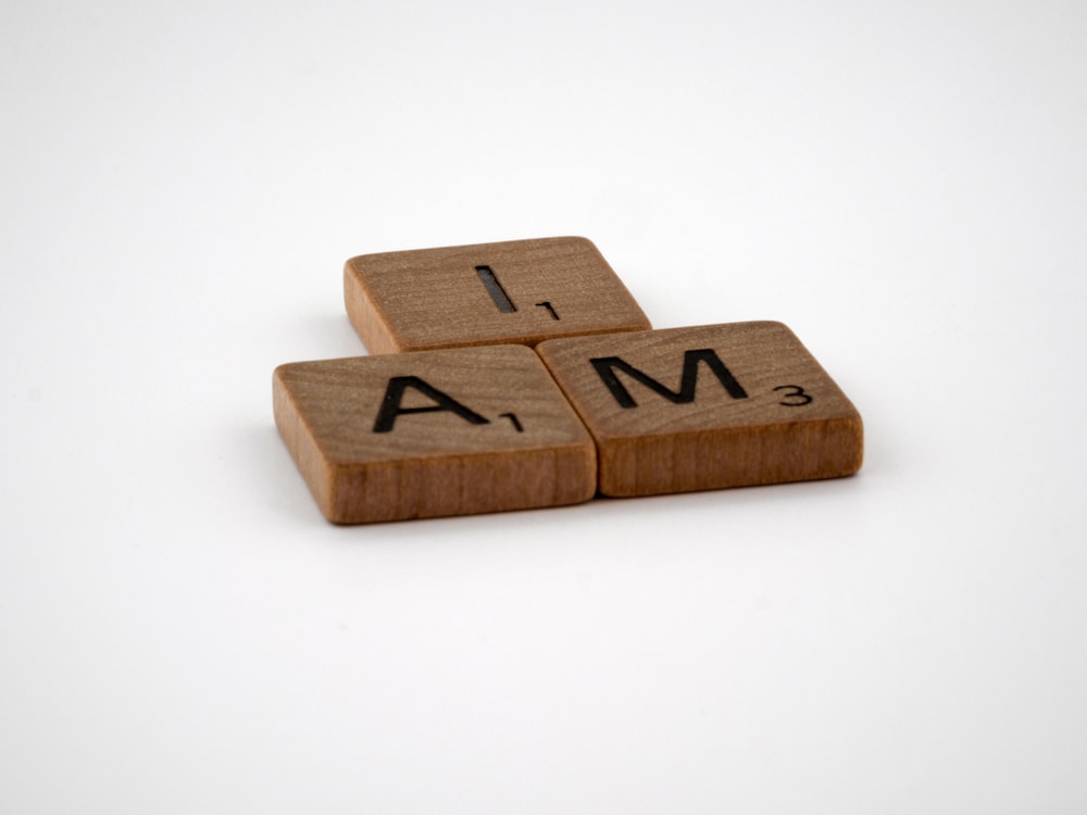 brown wooden letter t-letter