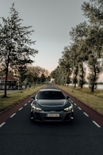 black porsche 911 on road during daytime