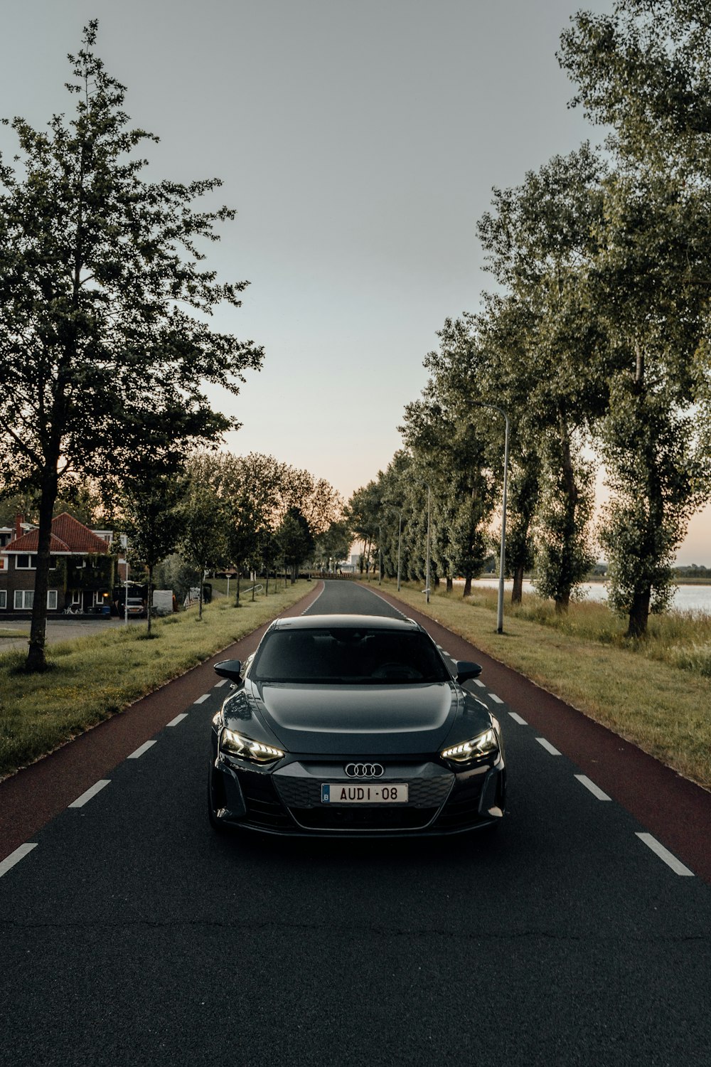 black porsche 911 on road during daytime