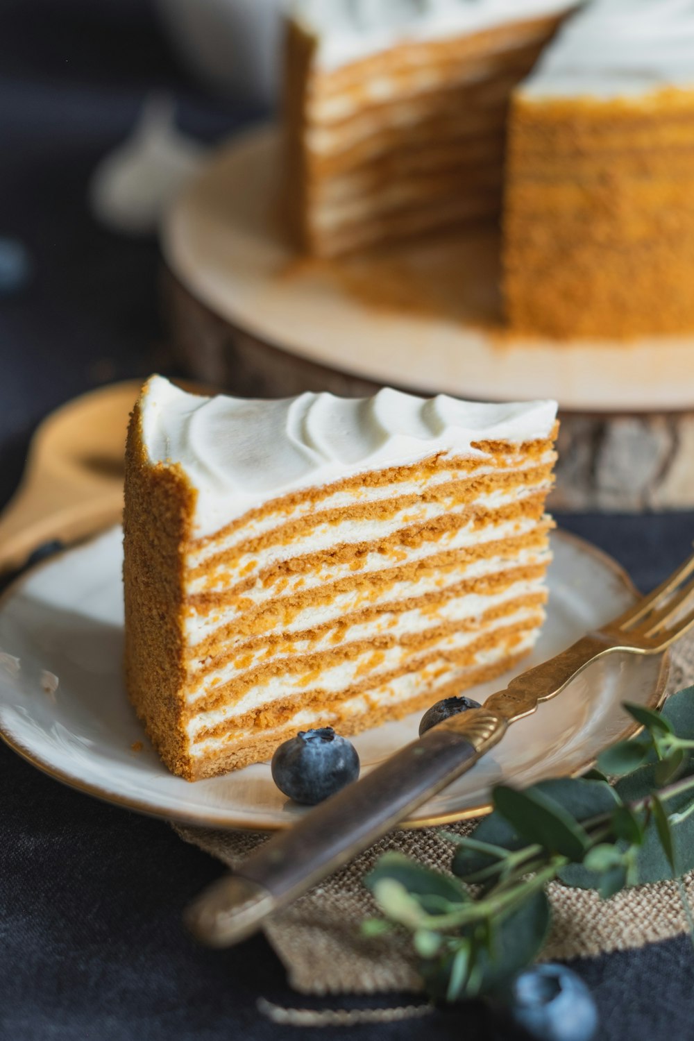 sliced of cake on white ceramic plate