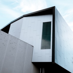 white concrete building under blue sky during daytime