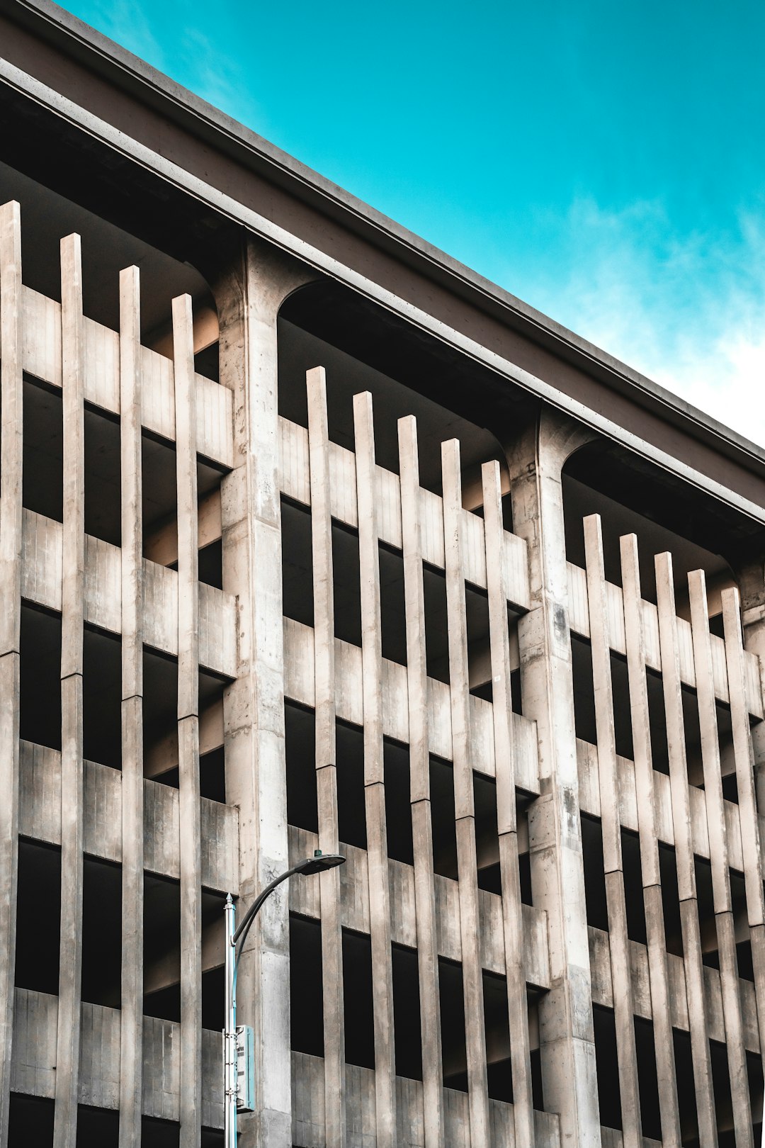 brown concrete building under blue sky during daytime