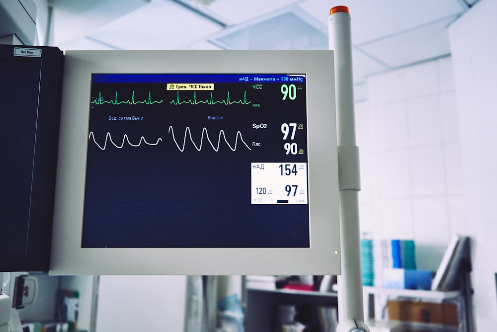 A medical measurements screen beside a patient's bed in hospital