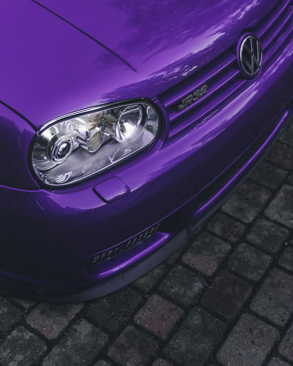 purple car with silver car wheel