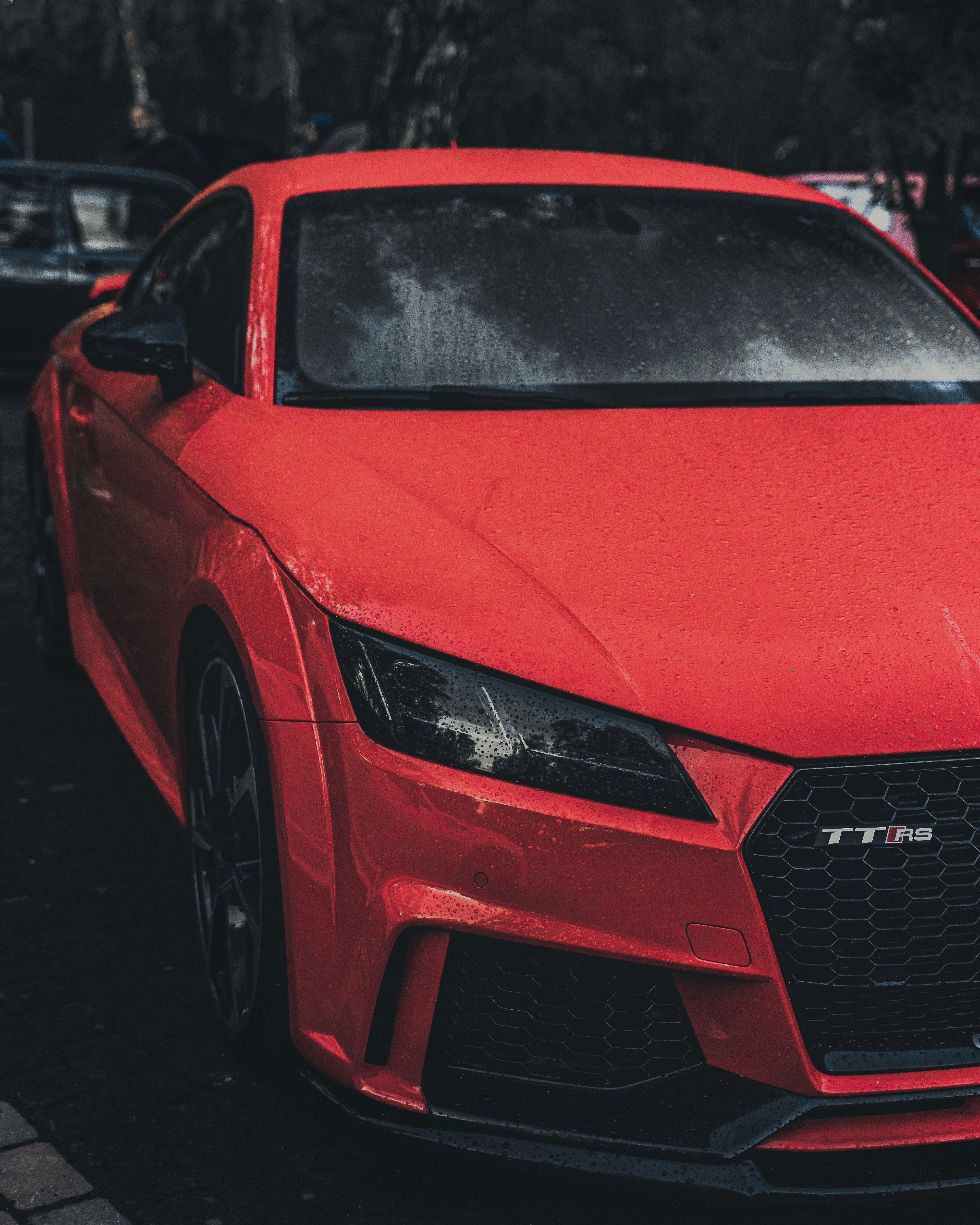 red audi r 8 on road during daytime