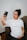 woman in white crew neck t-shirt holding black iphone 7 plus