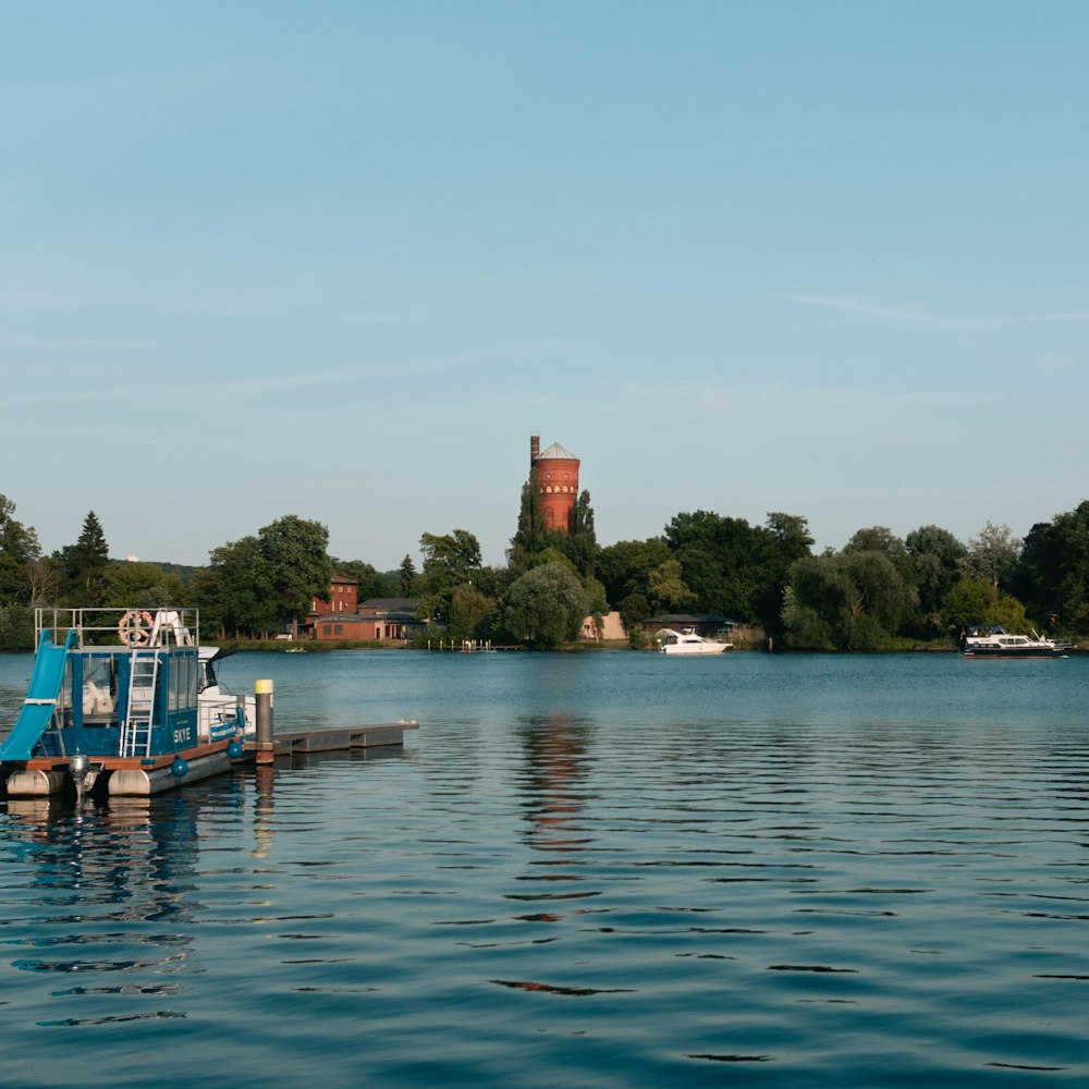 people riding on boat on body of water during daytime