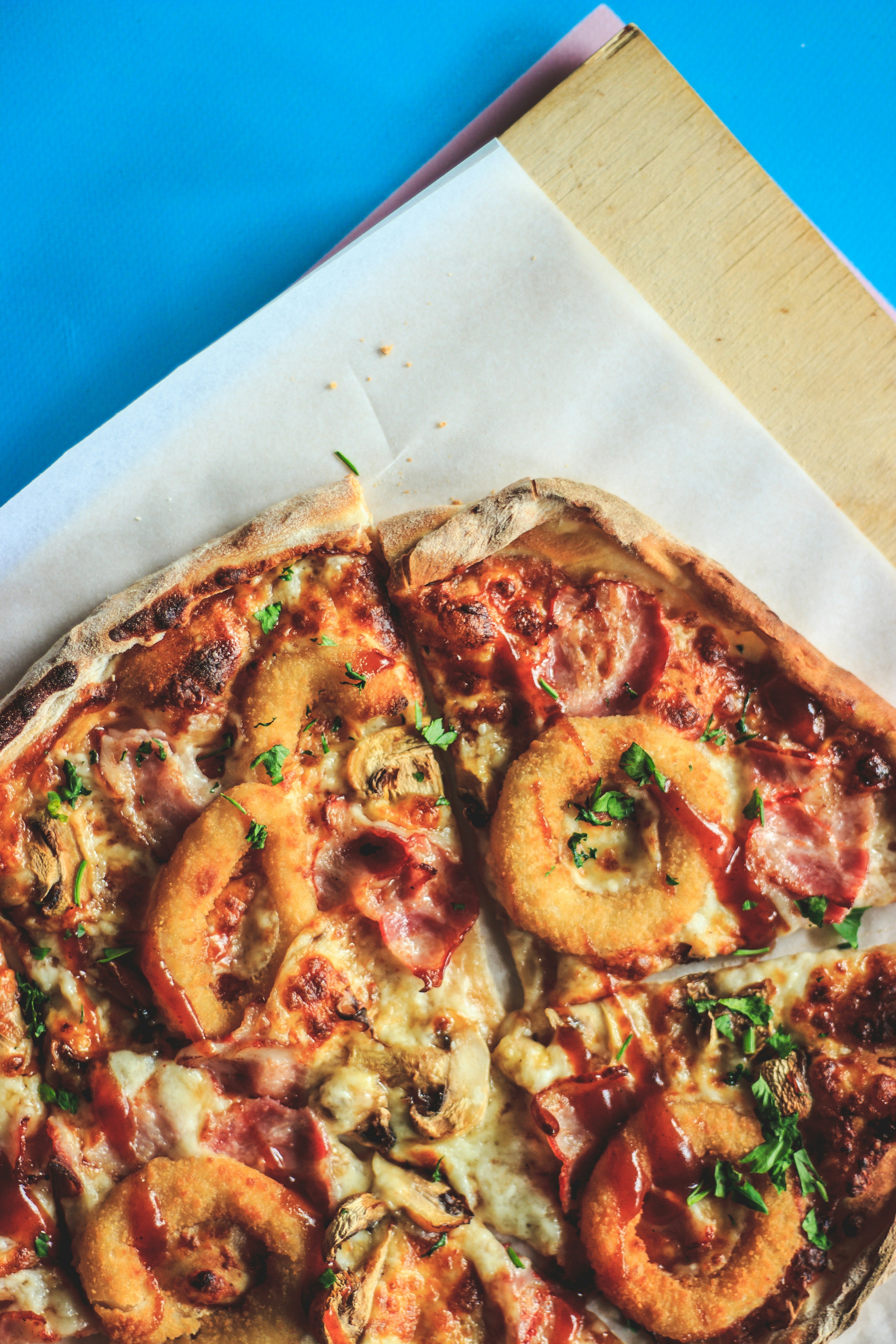 pizza on white paper plate