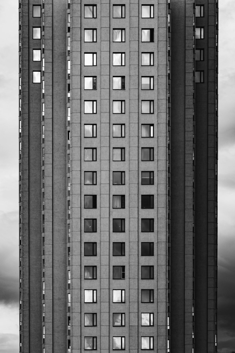 grayscale photo of high rise building