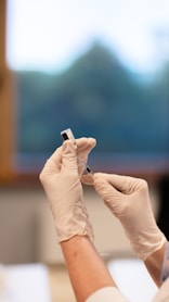 person holding injection