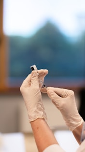 person holding injection