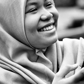 A joyful moment captured as a student completes a Quran memorization milestone with their instructor online.