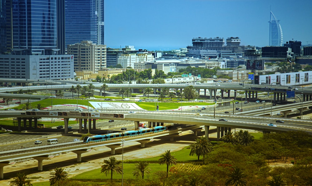 green and white train on track during daytime