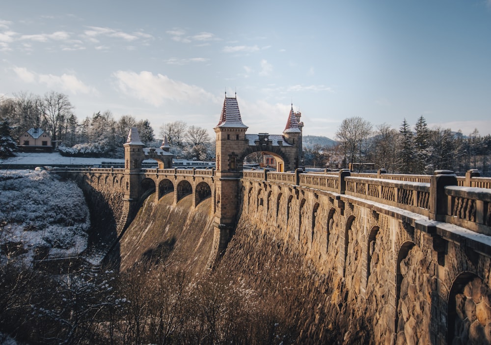 brown concrete bridge over river