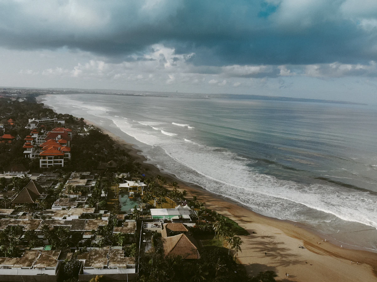 Sheltered coral reef lagoons and white sand beachfront of Nusa Dua