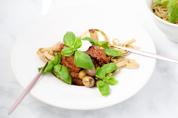 Cooked food on white ceramic plate