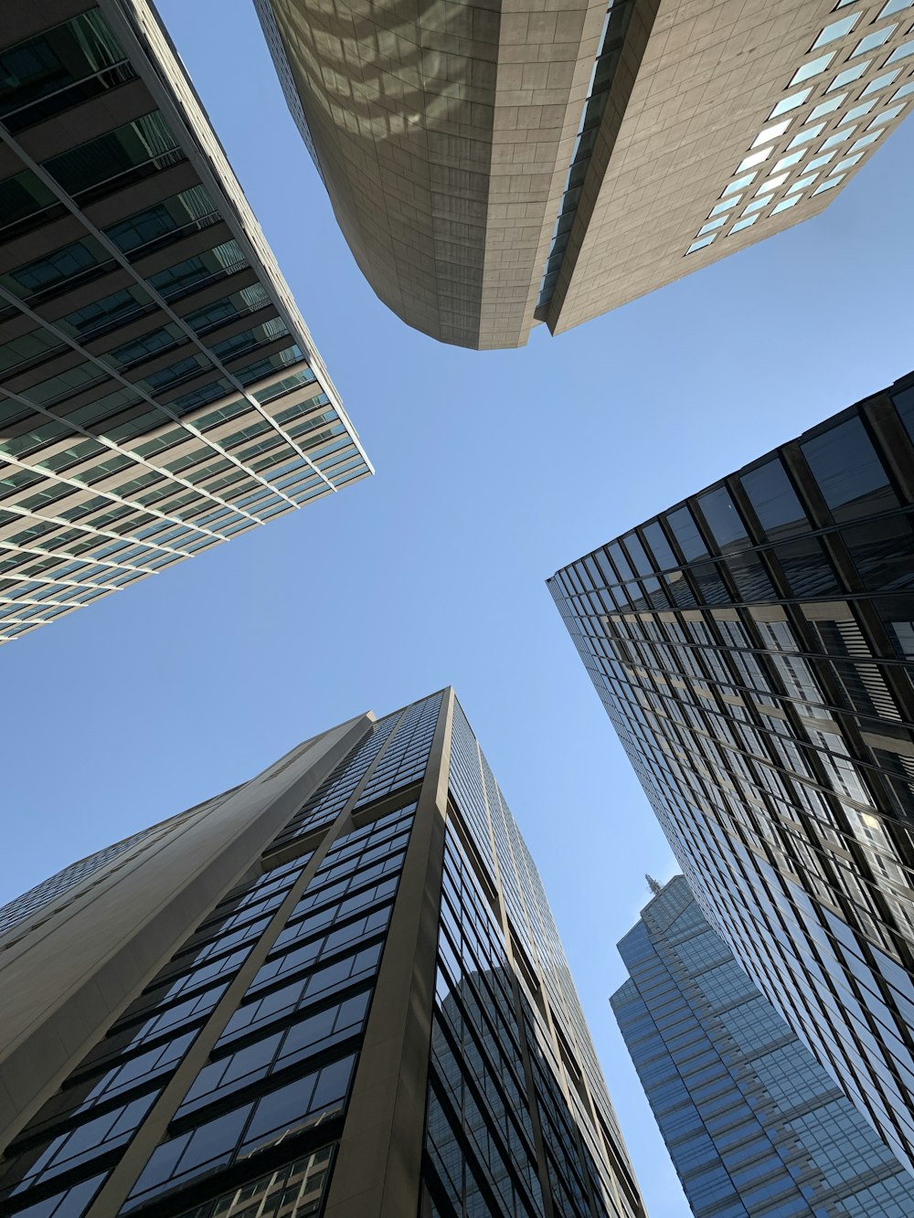 low angle photography of high rise buildings