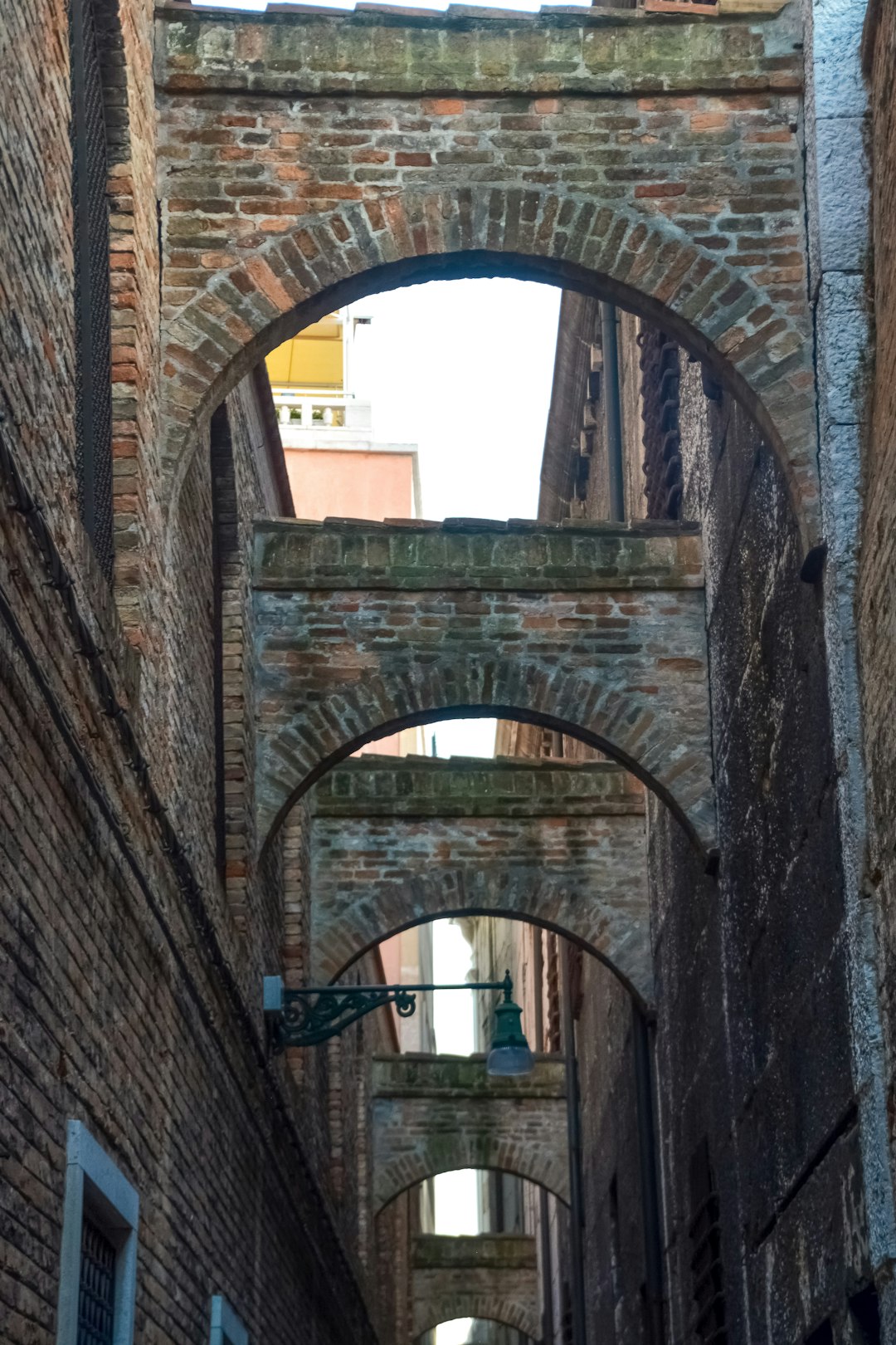 brown brick arch bridge during daytime