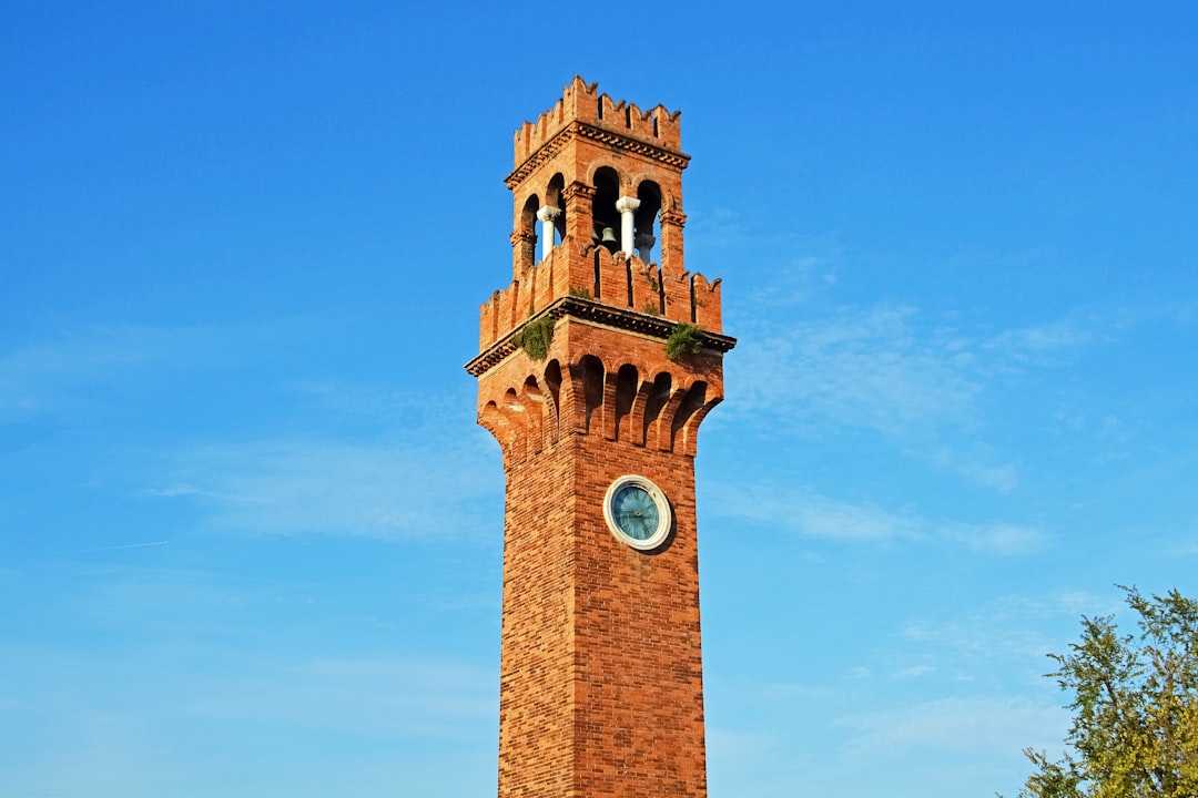 brown concrete tower under blue sky during daytime