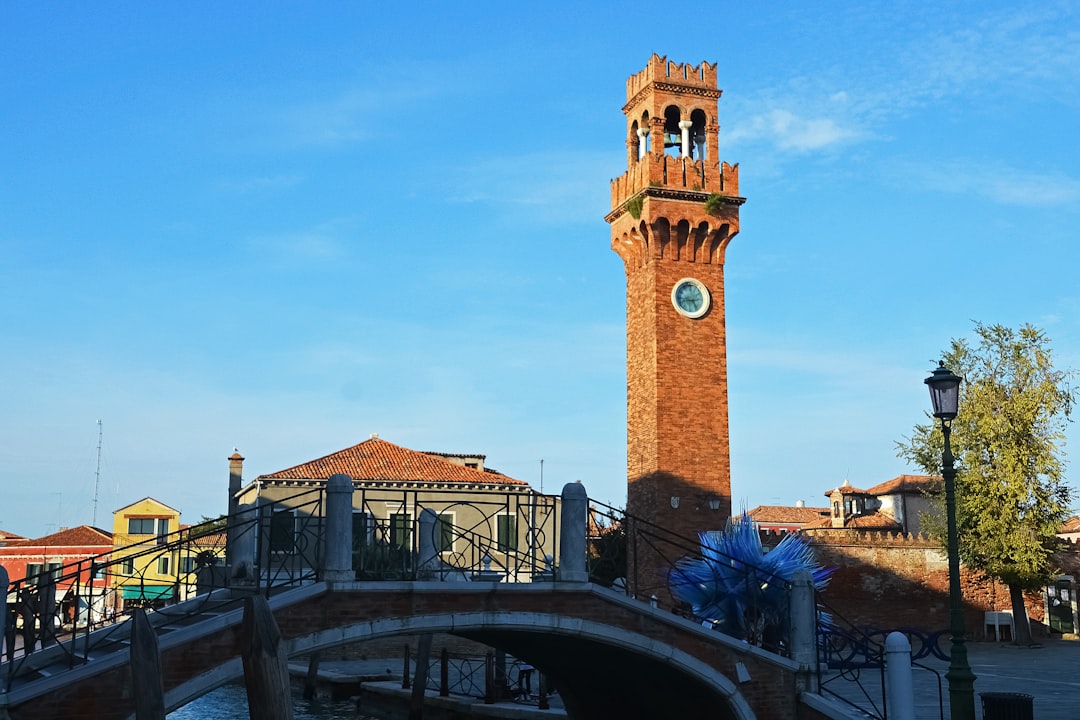 brown concrete tower under blue sky during daytime