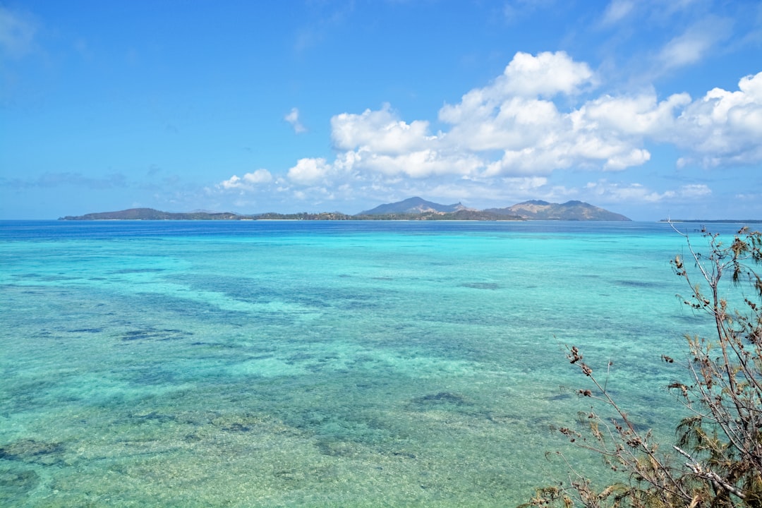 blue sea under blue sky during daytime