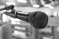 black and silver microphone on black and white photography