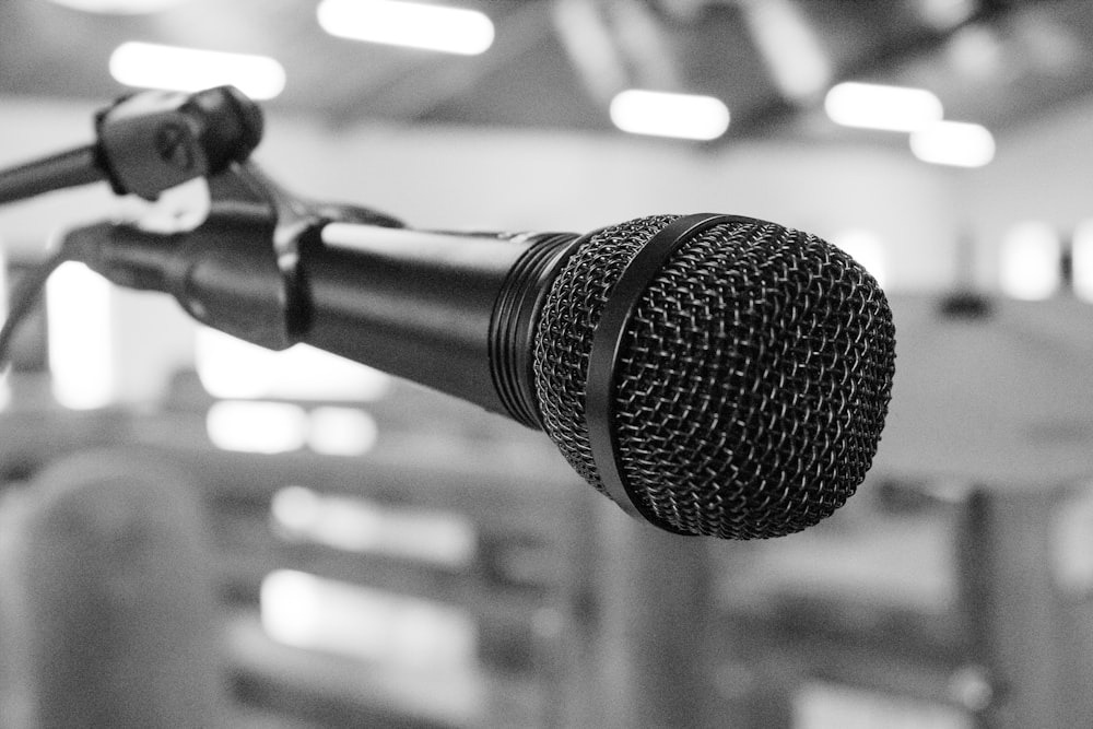 black and silver microphone on black and white photography