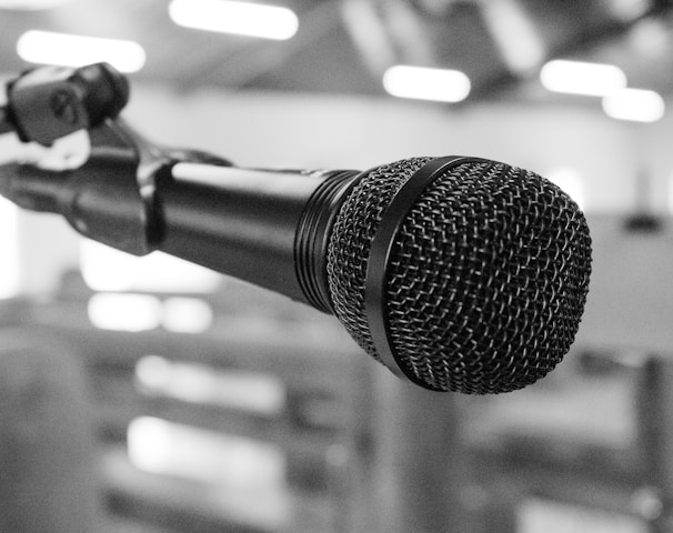 black and silver microphone on black and white photography