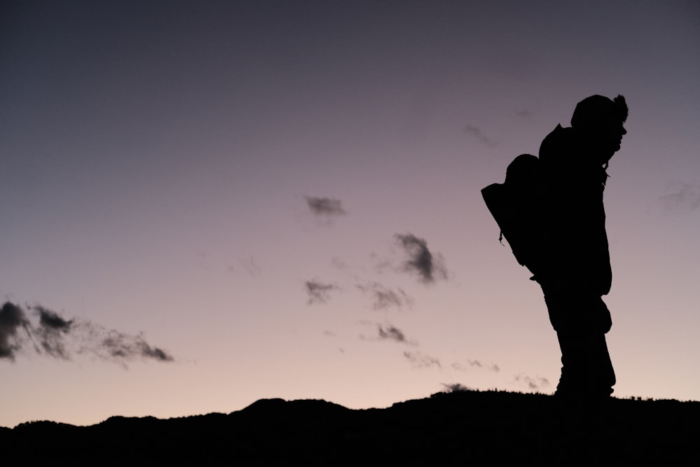 silhouette of mountain during sunset