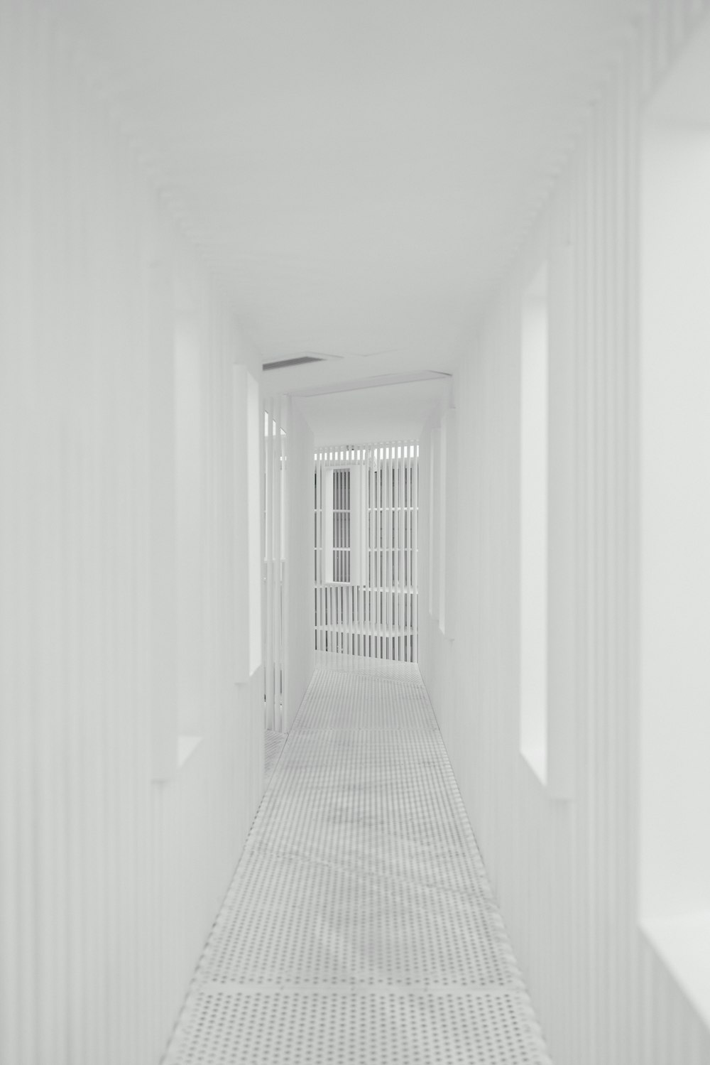 white hallway with white walls