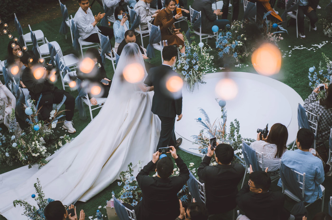 Non-alcoholic unity ceremony alternatives — The bride and groom light a unity candle together at the altar.