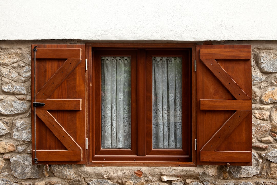 brown wooden window on white wall